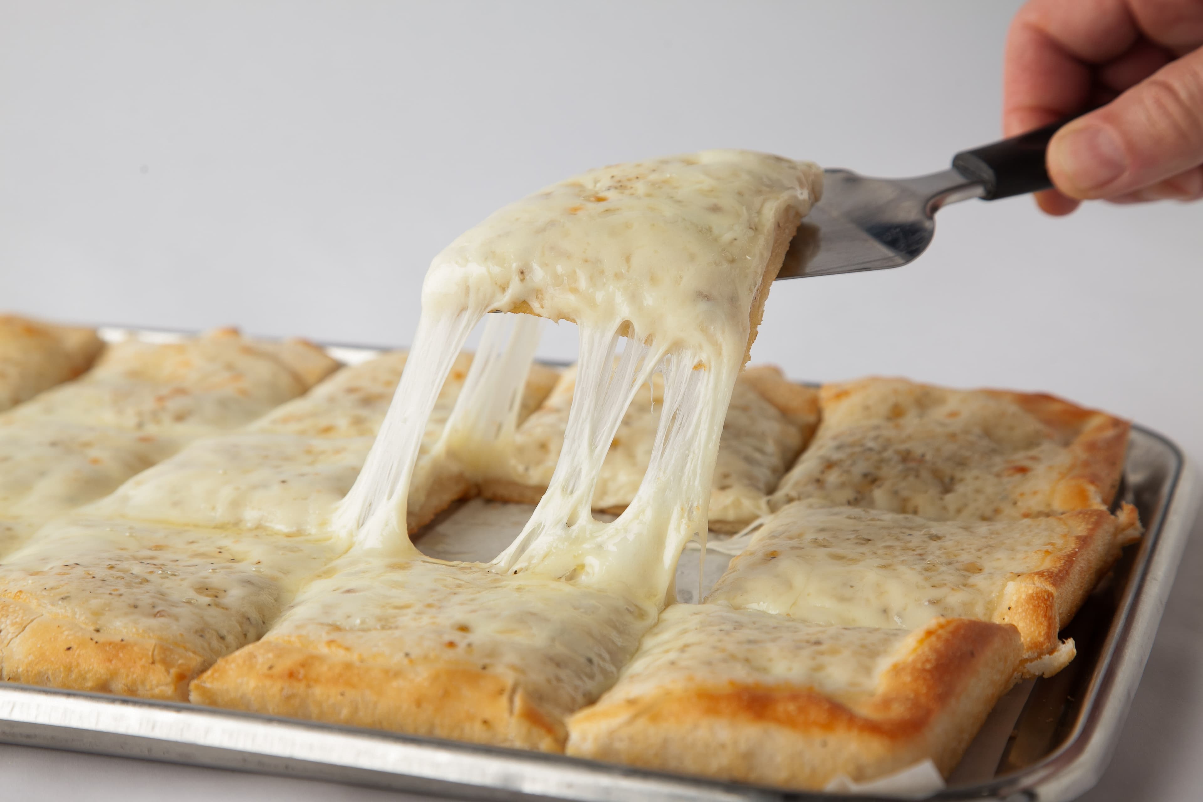 Pizza Oven handcrafted pizza cheese pull